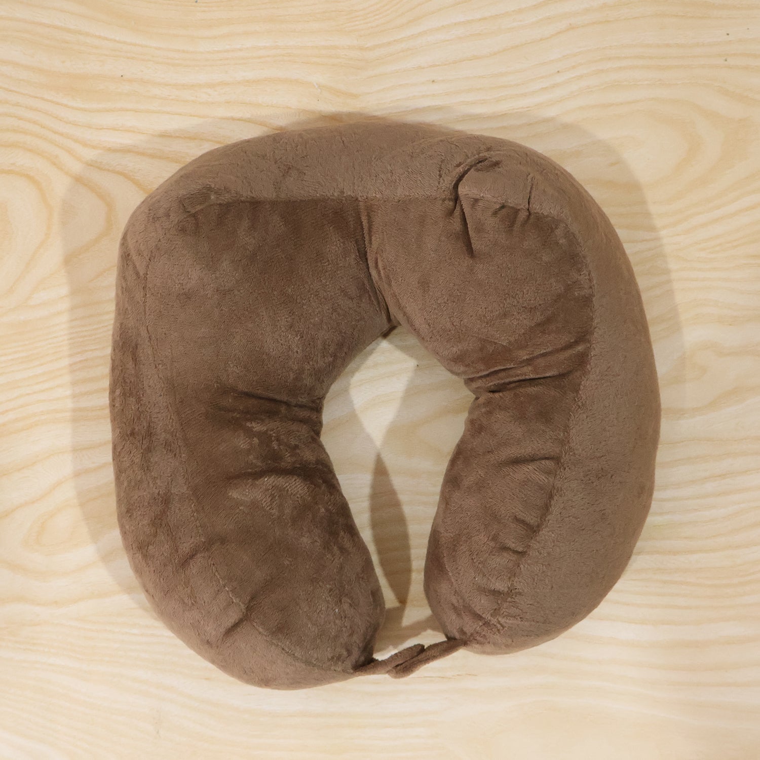 Lightweight brown U shape pillow for men's restful travel